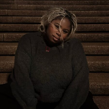 Ify Ify sitting on the Opera House steps